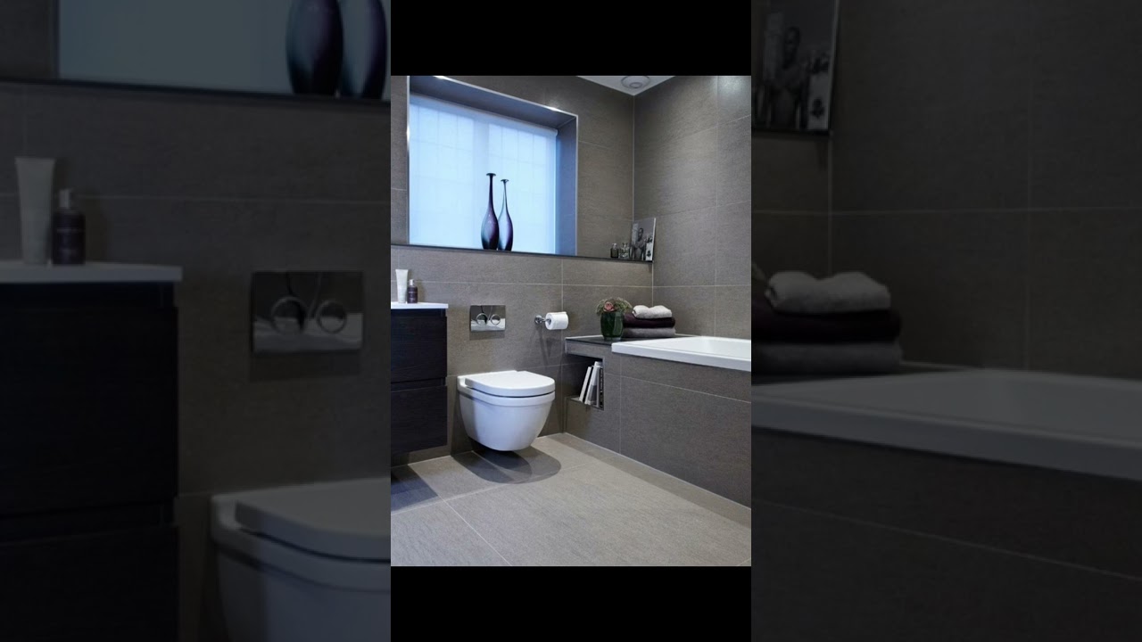 Baños funcionales pequeños con encimeras de color gris oscuro: elegancia práctica